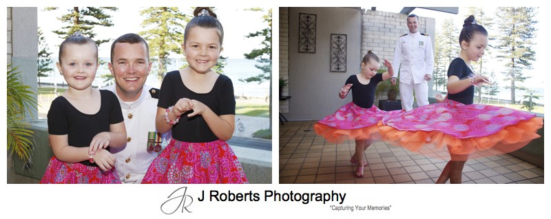 Groom with his 2 flower girls twirling in their dresses - sydney wedding photographer